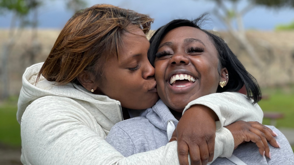 Destinee and Ursula Mack Hugging