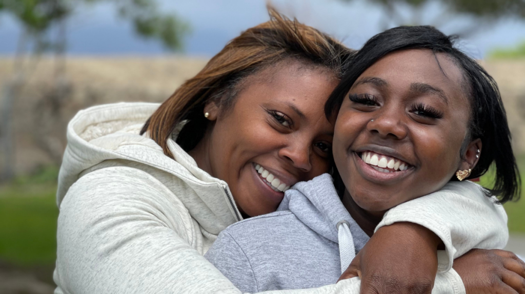 Destinee and Ursula Mack hugging